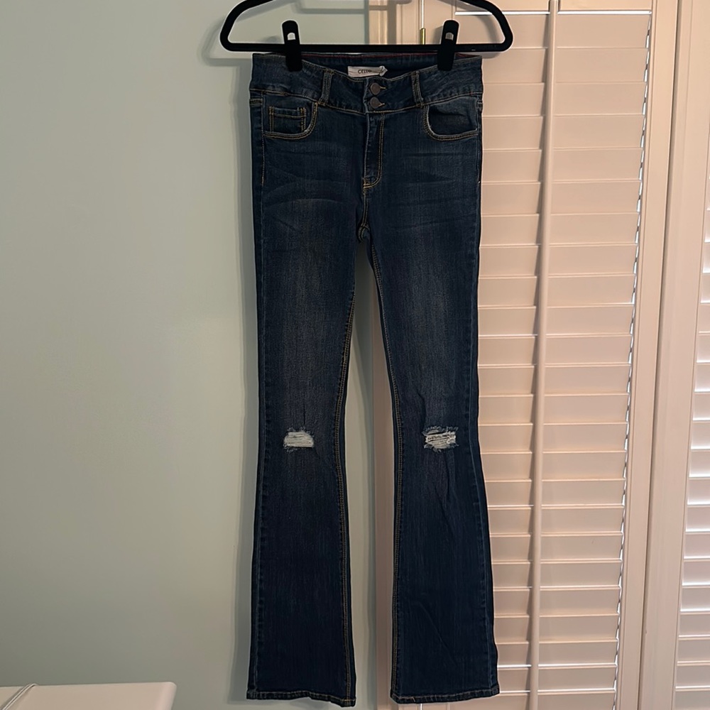 Cello boot cut jeans with rips on the knees